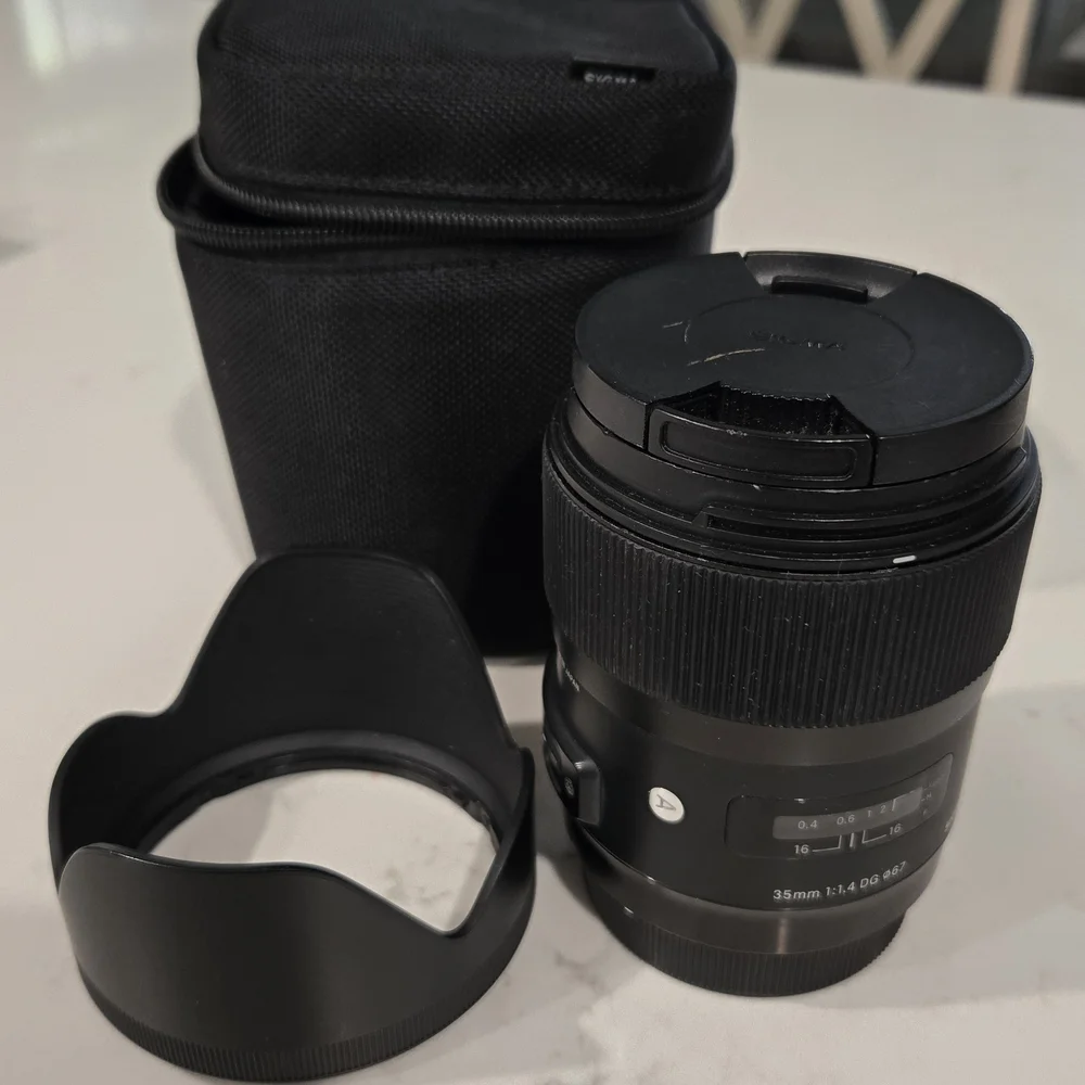 Sigma 35mm f/1.4 DG HSM ART Lens for Canon EOS Cameras With Lens Hood + Pouch